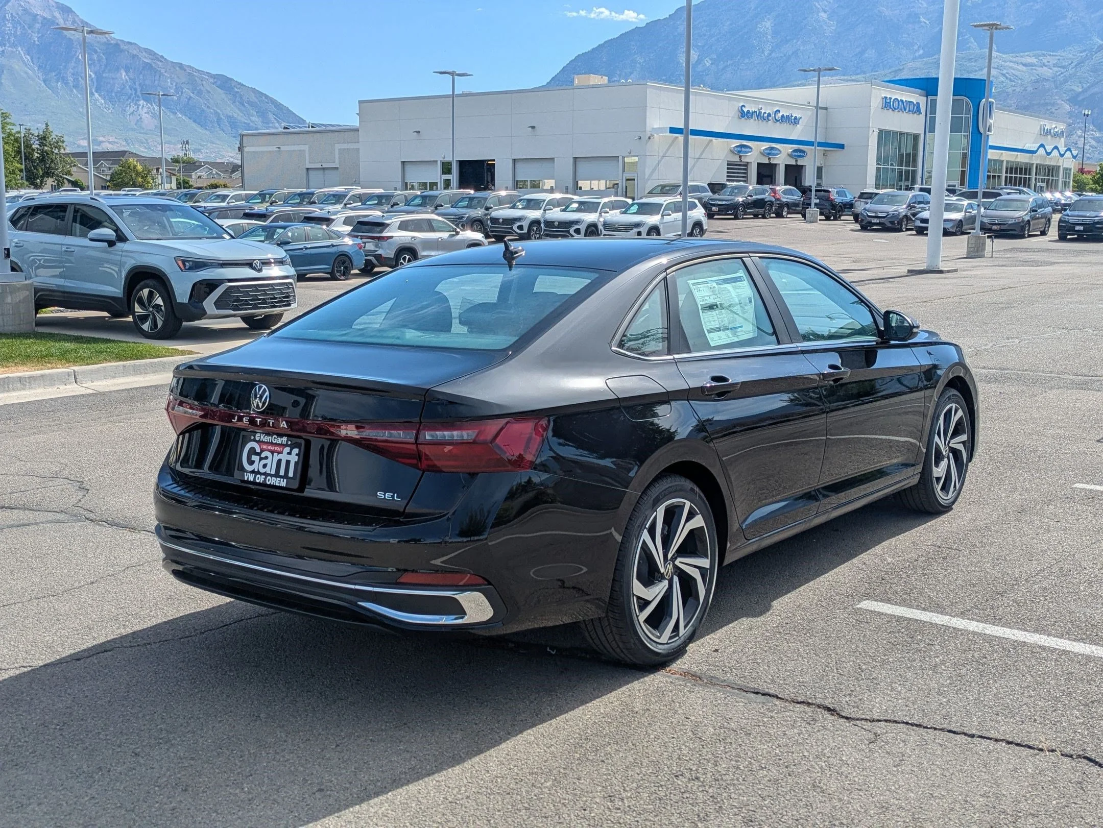 New 2026 Deep Black Pearl Volkswagen SEL image 3