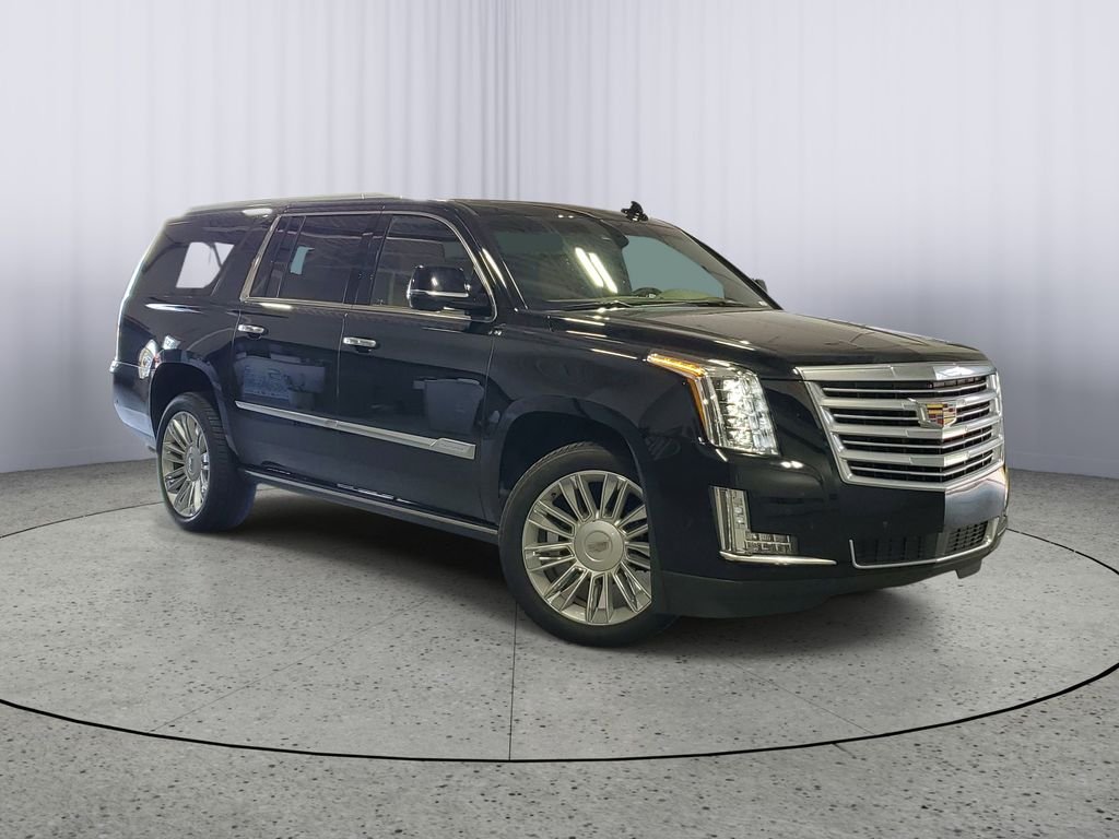 Used 2017 Black Raven Cadillac Platinum image 1