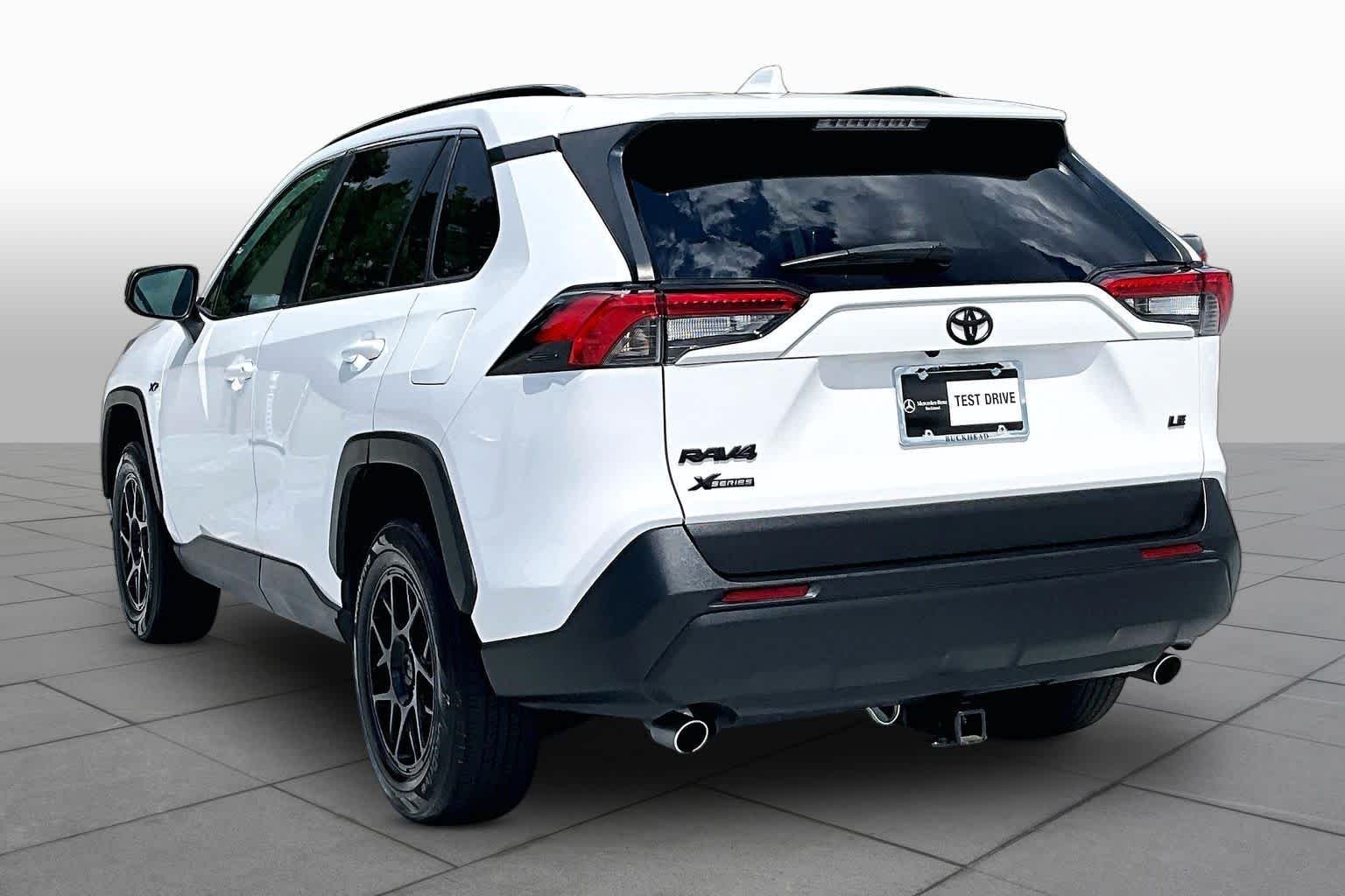 Used 2021 Super White Toyota LE image 12