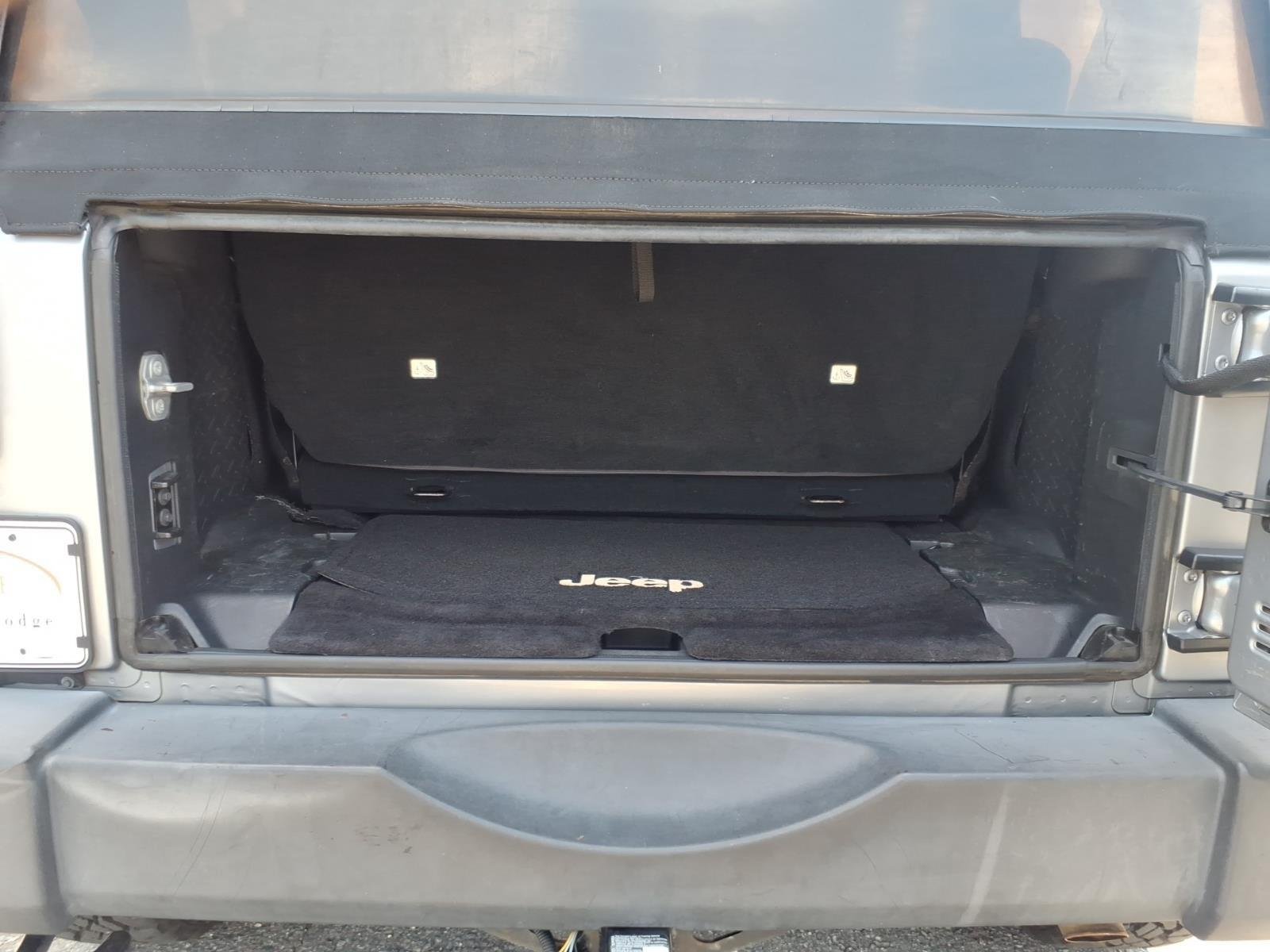Used 2015 Billet Silver Metallic Clearcoat Jeep Sport image 30