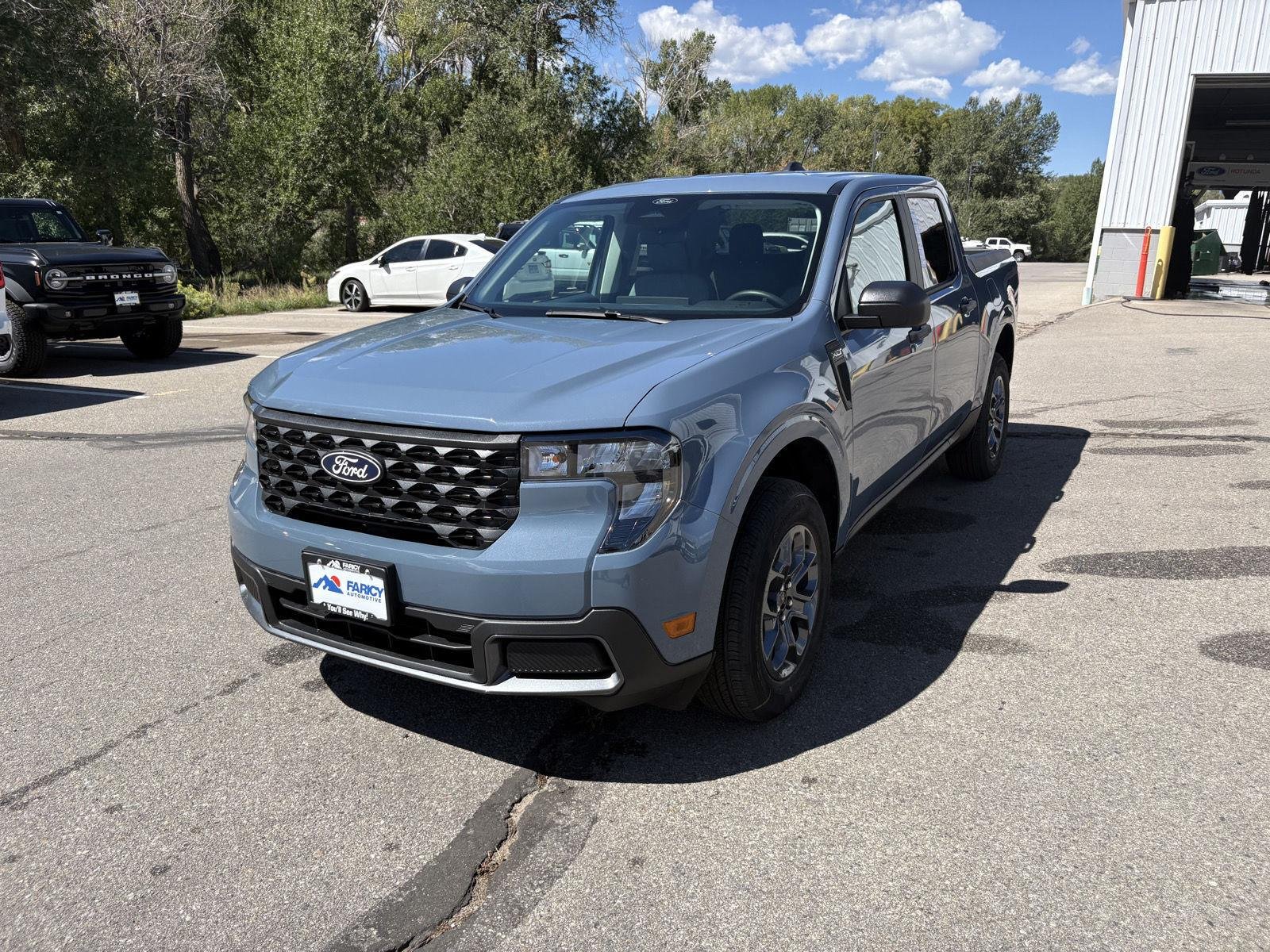 Used 2026 Azure Gray Metallic Tri-Coat Ford XLT image 1