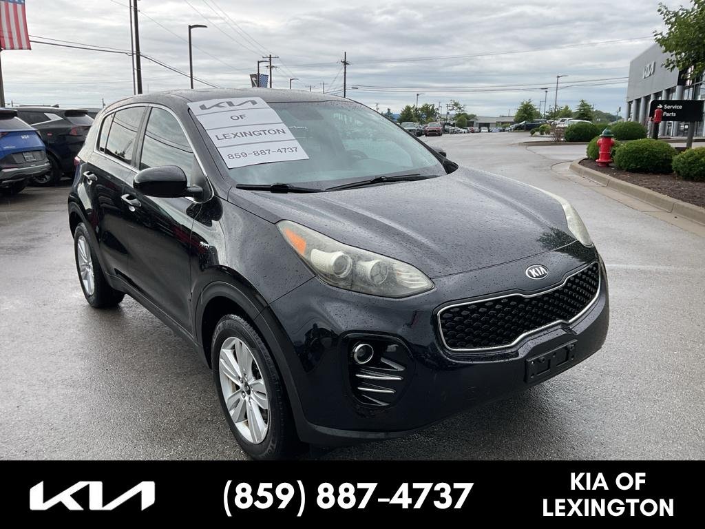 Used 2018 Black Cherry Kia LX image 1