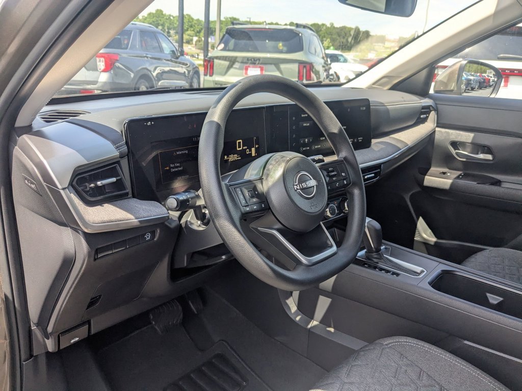 Used 2025 Canyon Bronze Metallic Nissan SV image 13