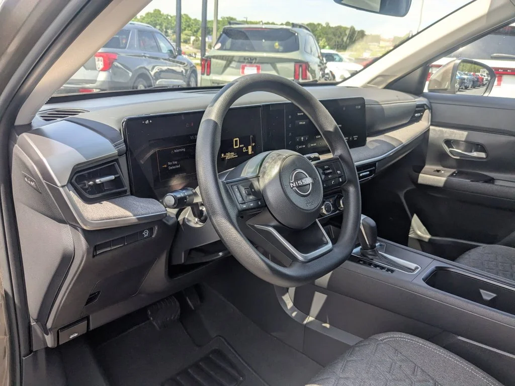 Used 2025 Canyon Bronze Metallic Nissan SV image 13