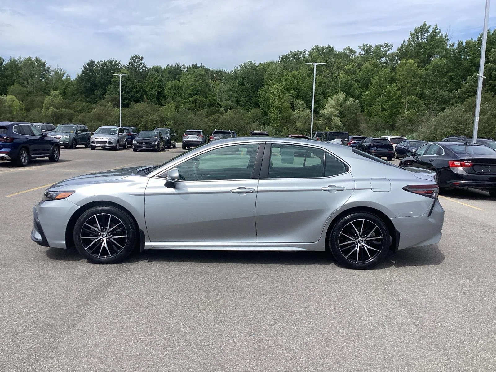 Used 2023 Celestial Silver Metallic Toyota SE image 4