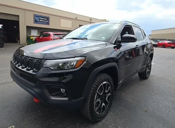 Used 2024 Black Jeep Trailhawk image 1
