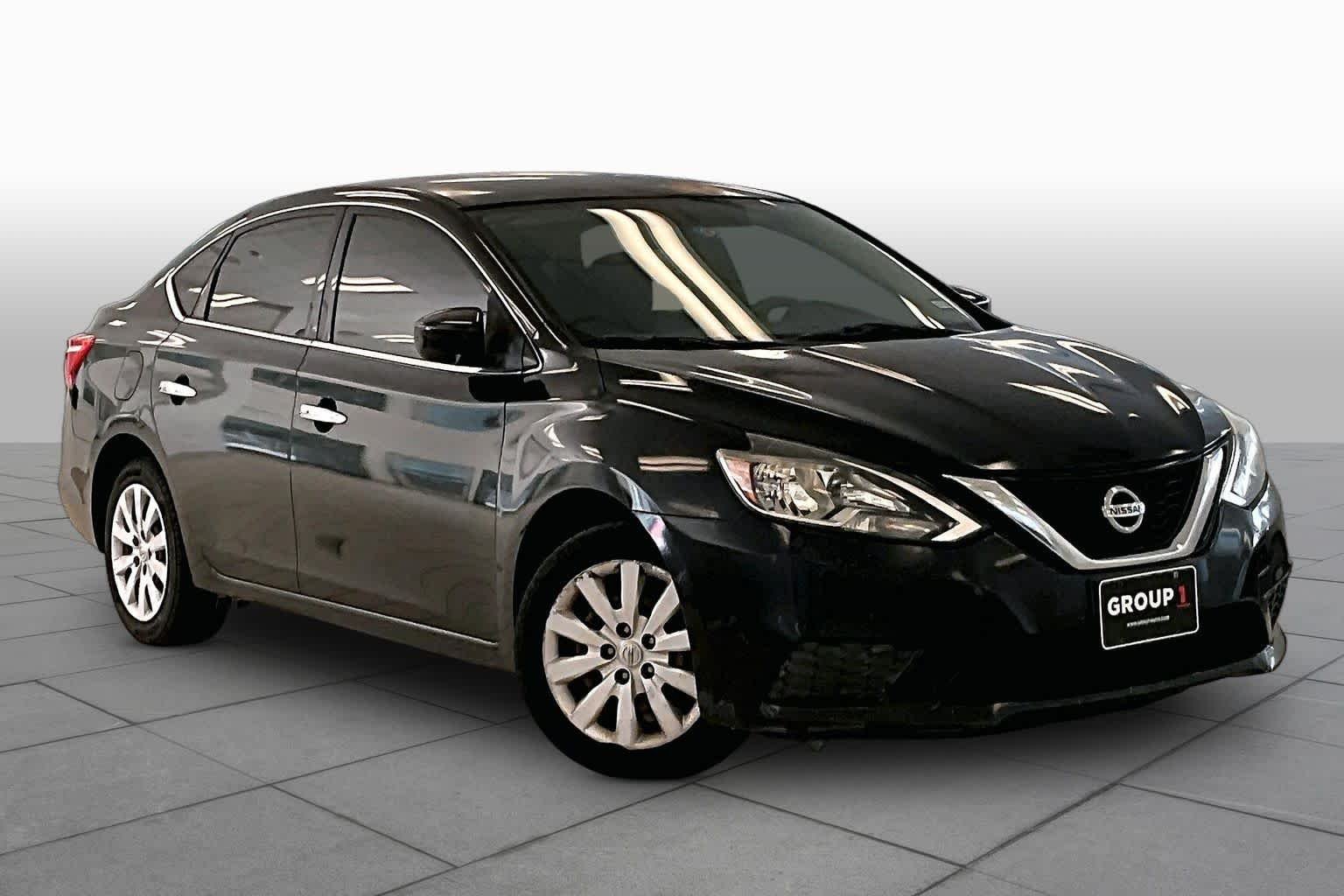 Used 2017 Super Black Nissan SV image 2