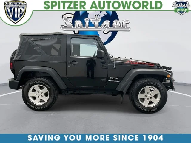 Used 2013 Black Clearcoat Jeep Sport image 11