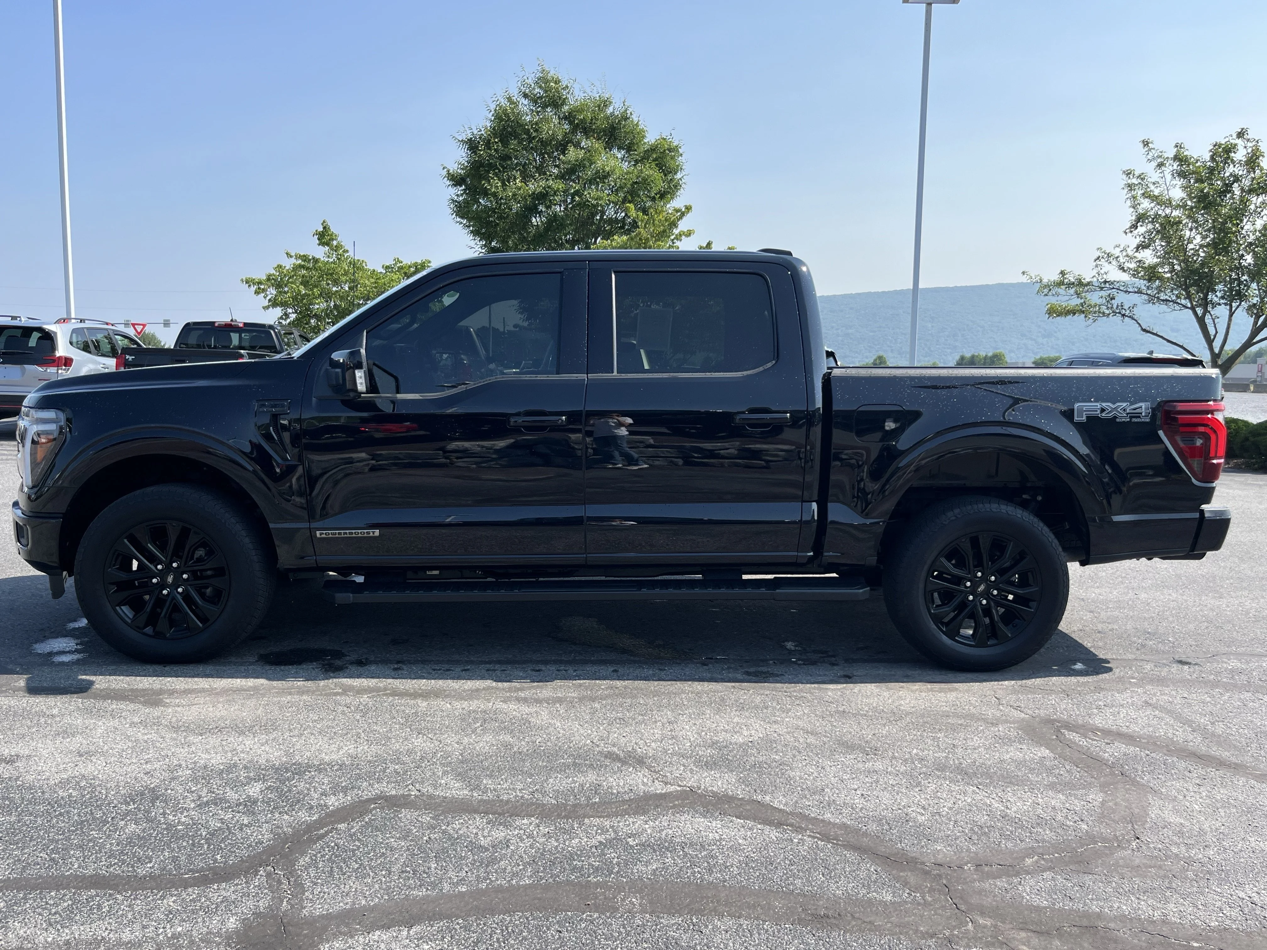 Used 2025 Black Metallic Ford Lariat image 9
