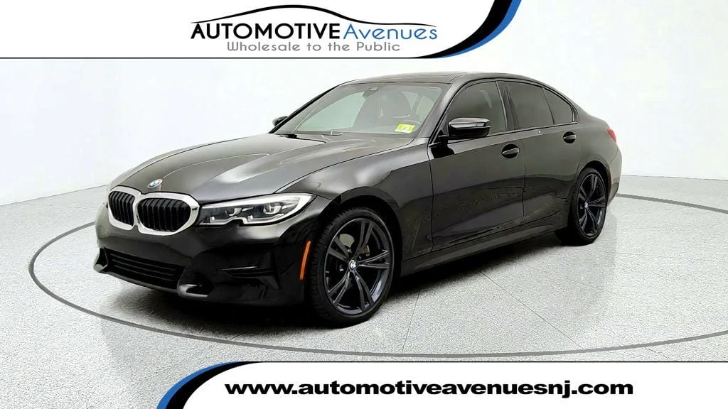 Used 2021 Jet Black BMW 330i xDrive image 1
