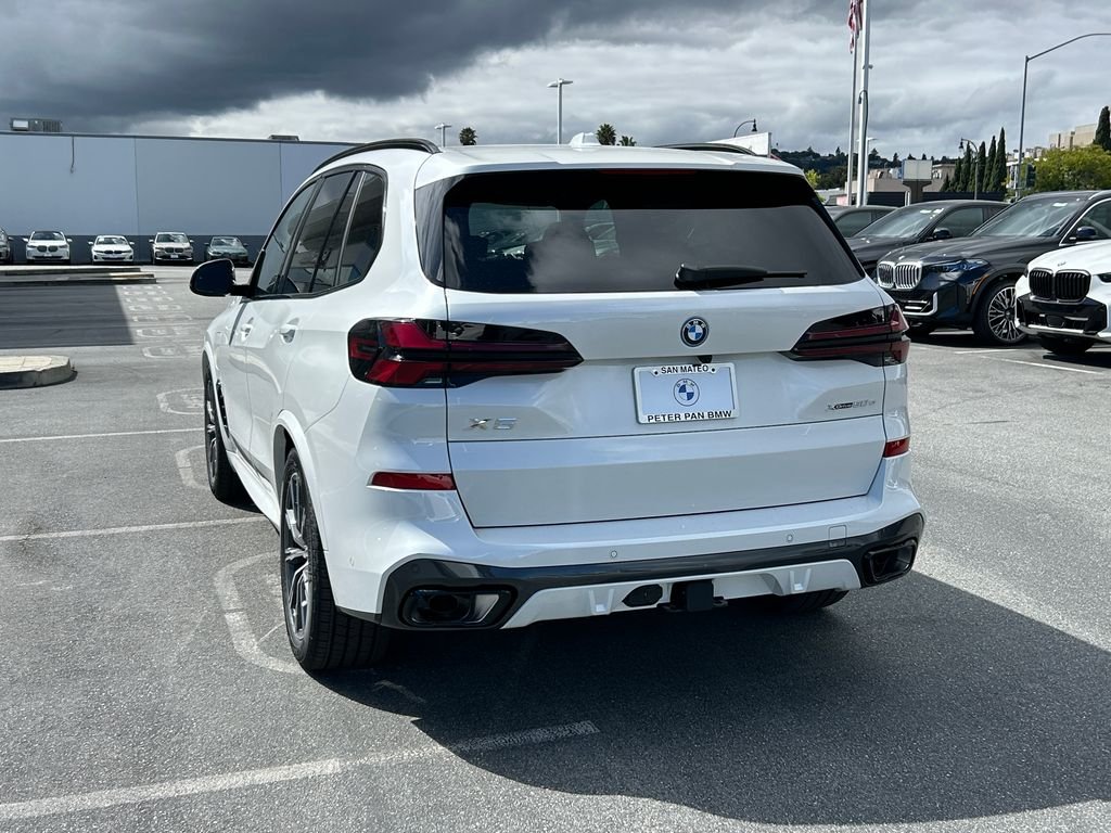 New 2026 Mineral White Metallic BMW xDrive50e image 3