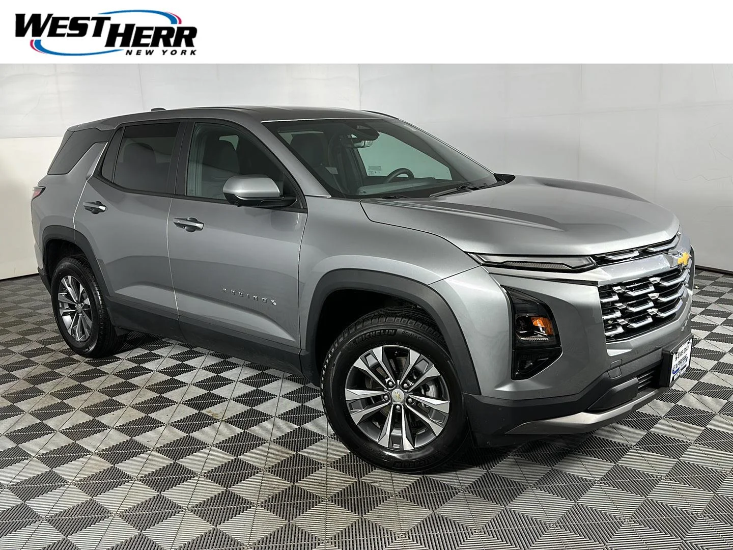 Used 2025 Sterling Gray Metallic Chevrolet AWD LT image 1