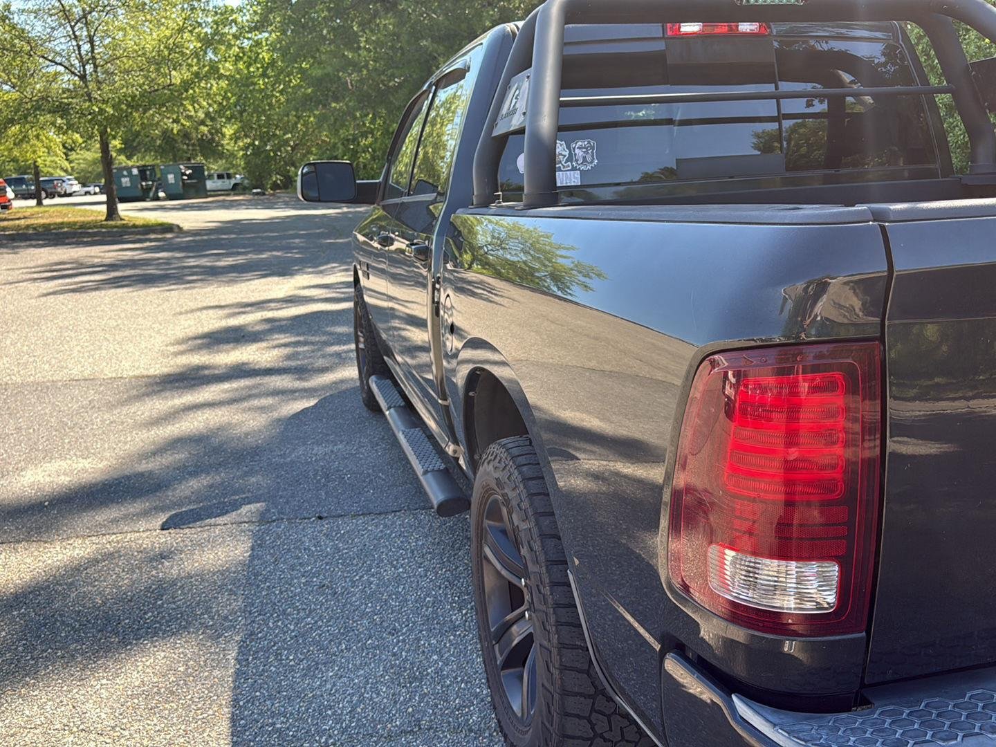 Used 2015 Brilliant Black Crystal Pearl Ram Sport image 9