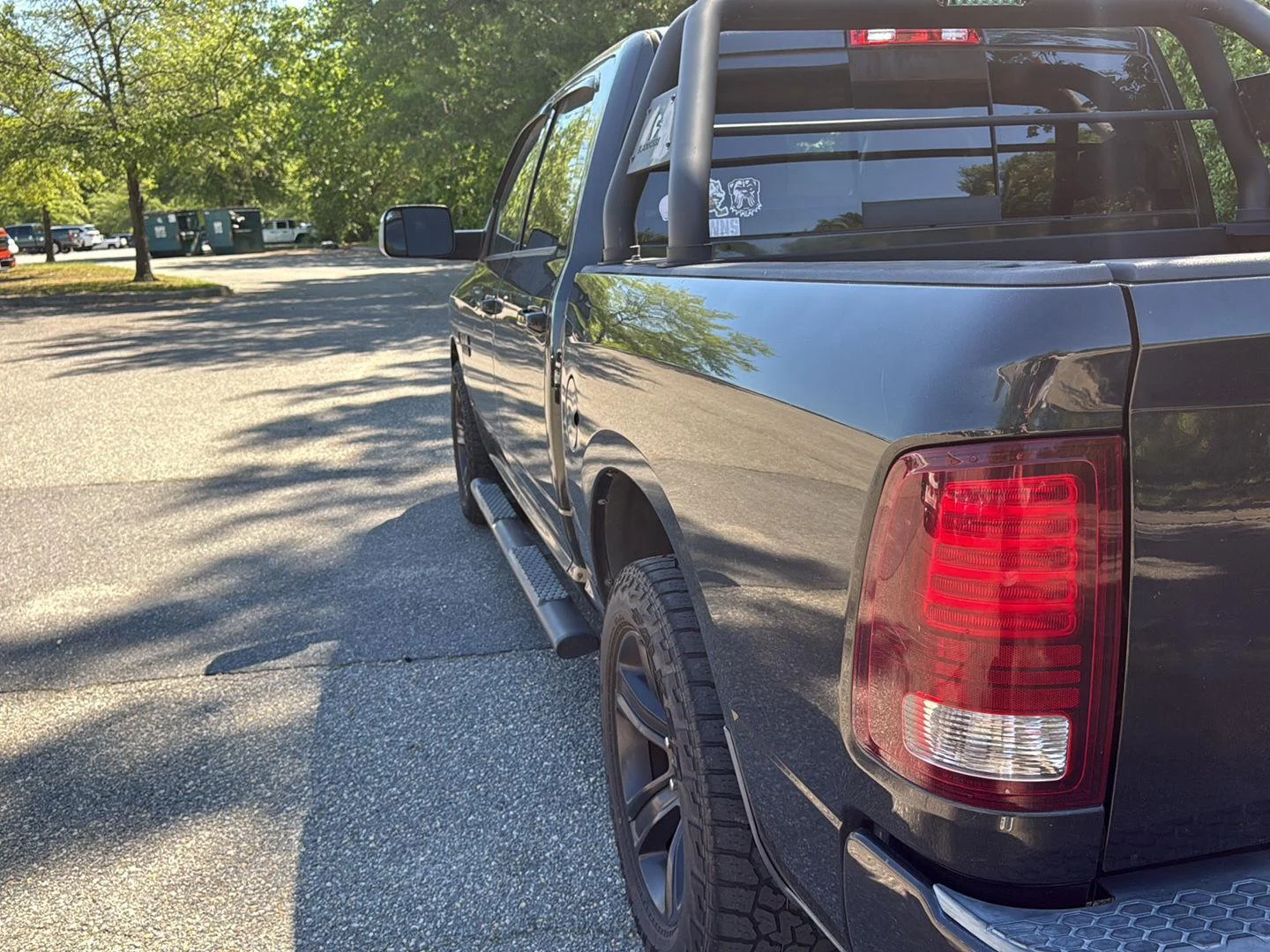 Used 2015 Brilliant Black Crystal Pearl Ram Sport image 9