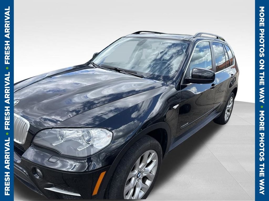 Used 2013 Black BMW xDrive35i image 1