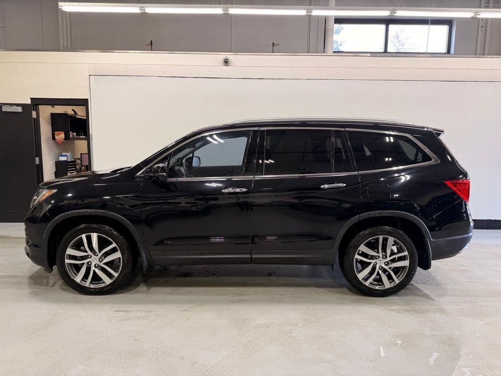Used 2017 Honda Pilot Touring with VIN 5FNYF6H9XHB012533 for sale in Golden Valley, Minnesota