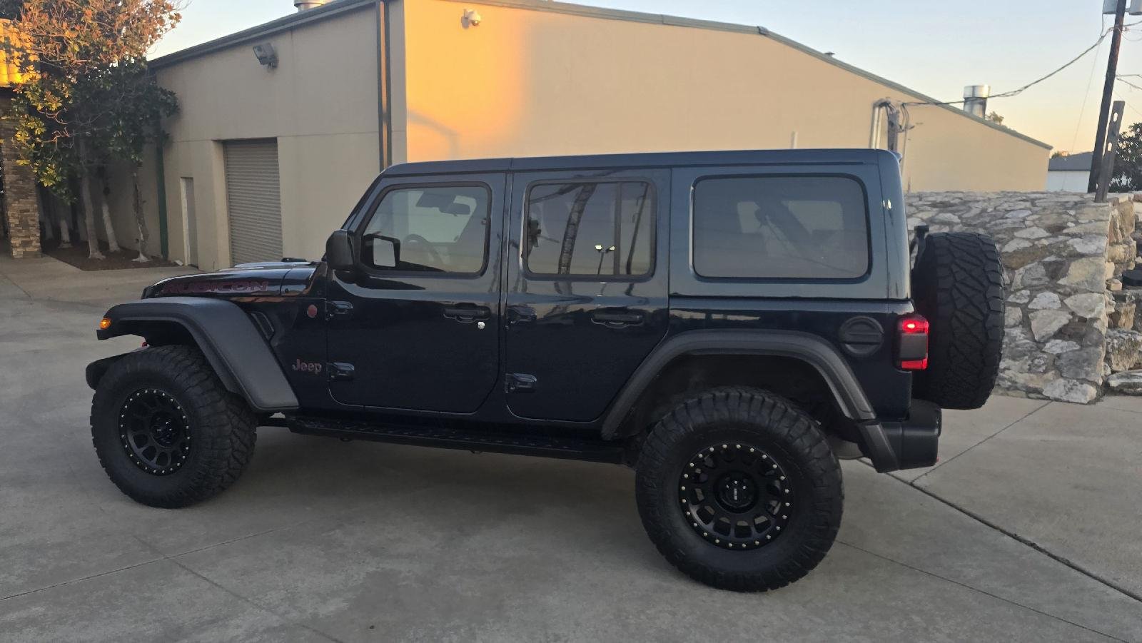 Used 2025 Fathom Blue Pearl Jeep Rubicon image 2