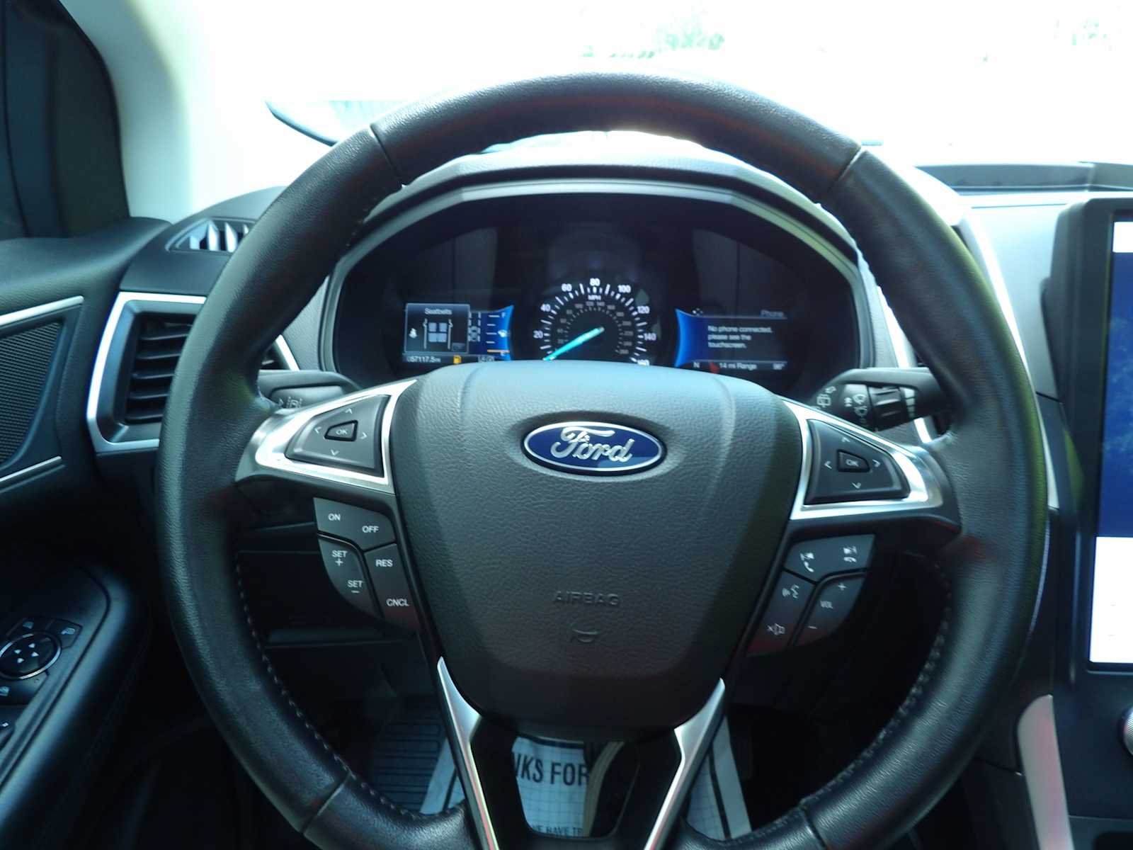 Used 2022 Agate Black Metallic Ford SEL image 18