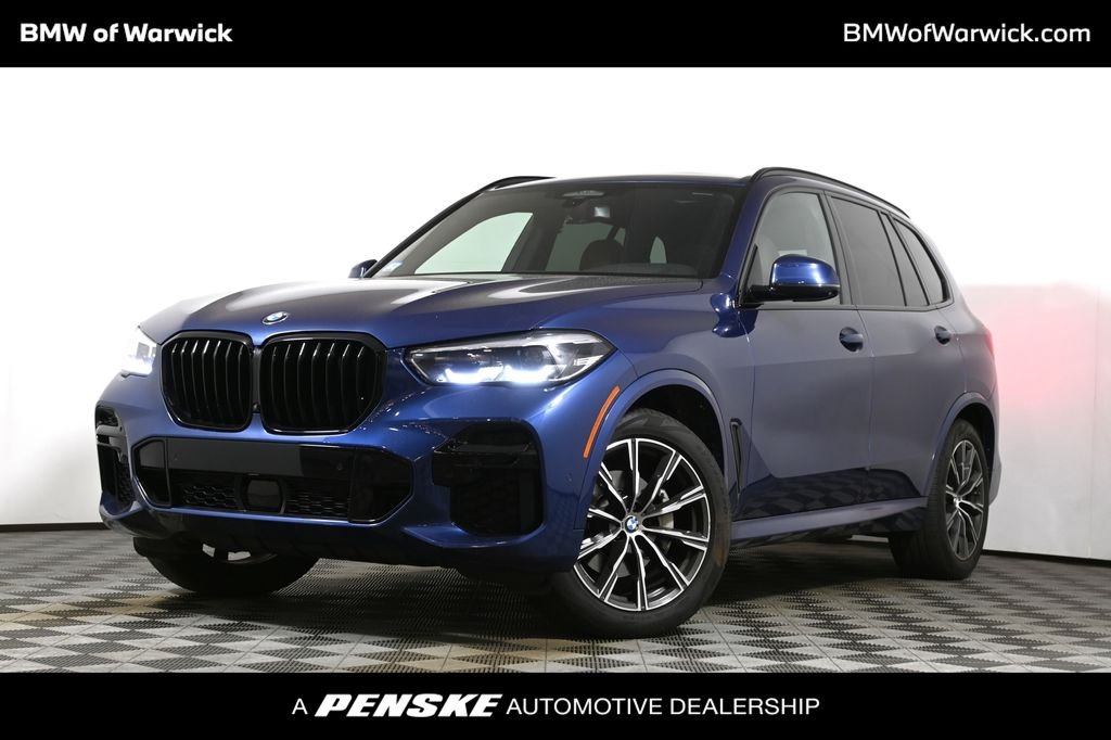 Certified Used 2023 Blue Metallic BMW xDrive40i image 1