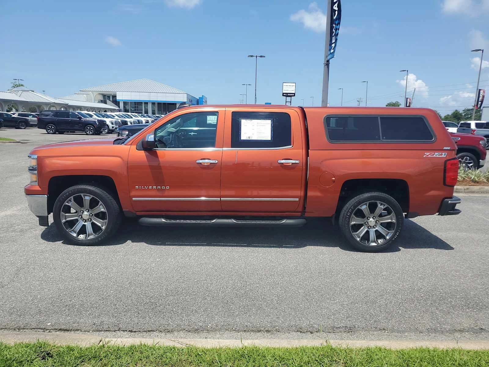 Used 2015 SUNSET ORANGE METALLIC Chevrolet LTZ image 2