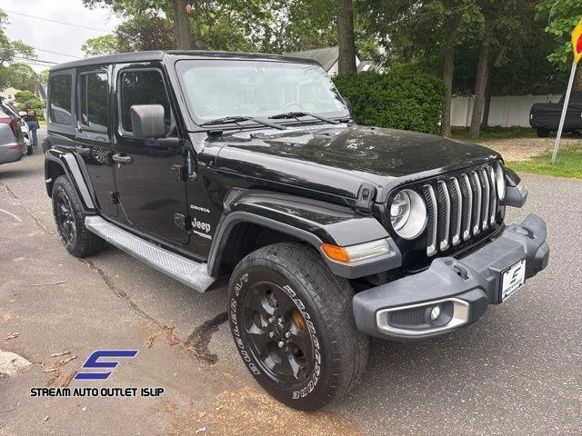 Used 2018 Black Jeep Unlimited Sahara image 7