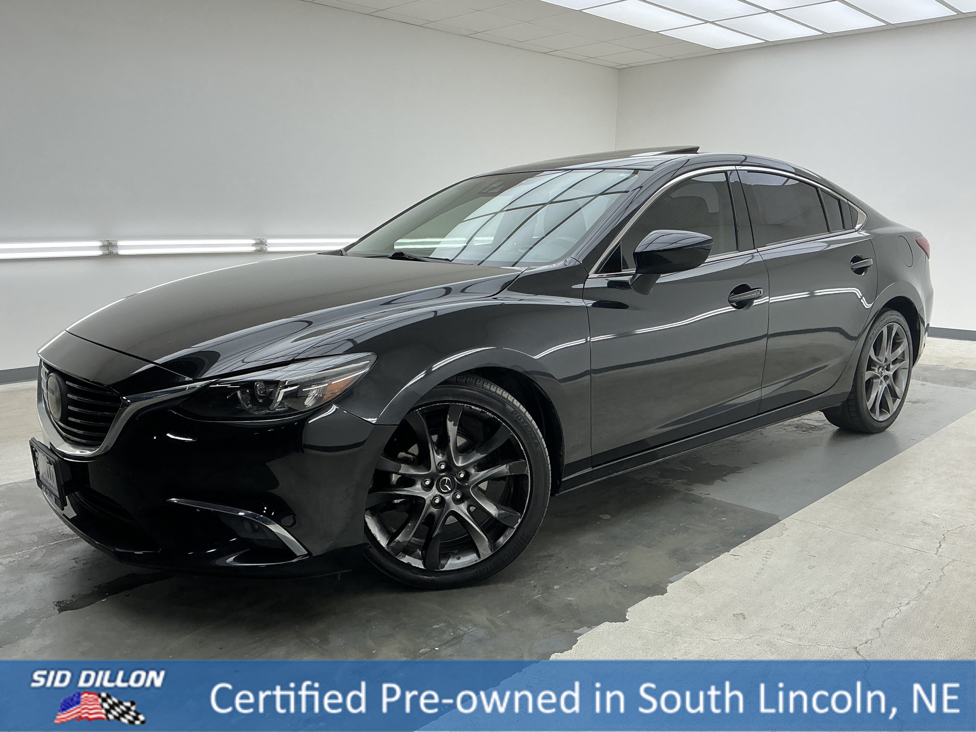 Used 2016 Jet Black Mica Mazda i Grand Touring image 1