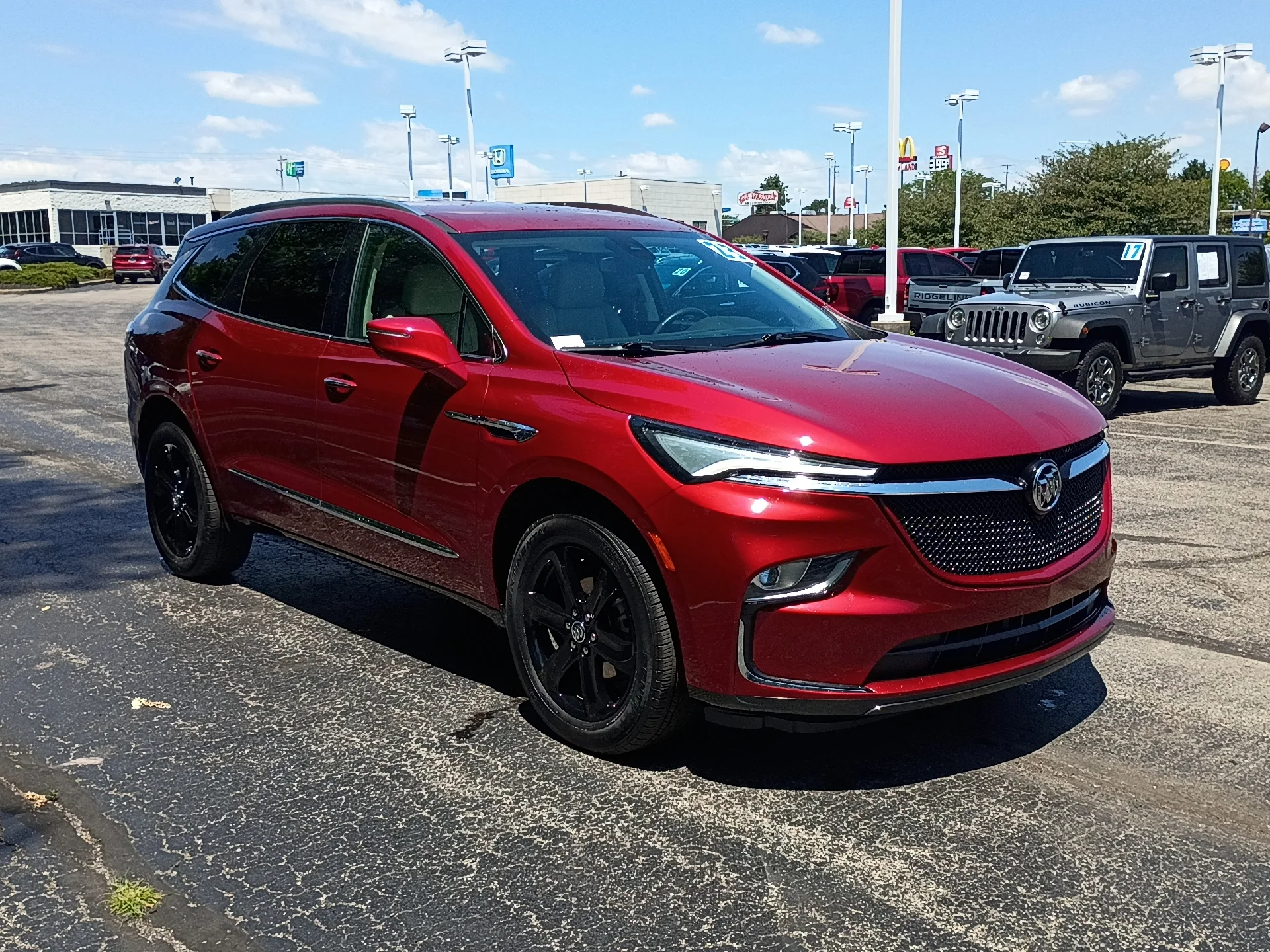 Used 2023 Cherry Red Tintcoat Buick Essence image 1