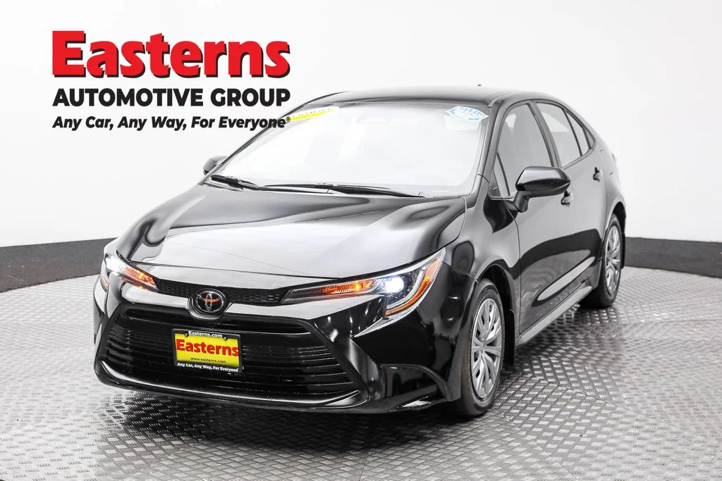 Used 2024 Black Toyota LE image 1
