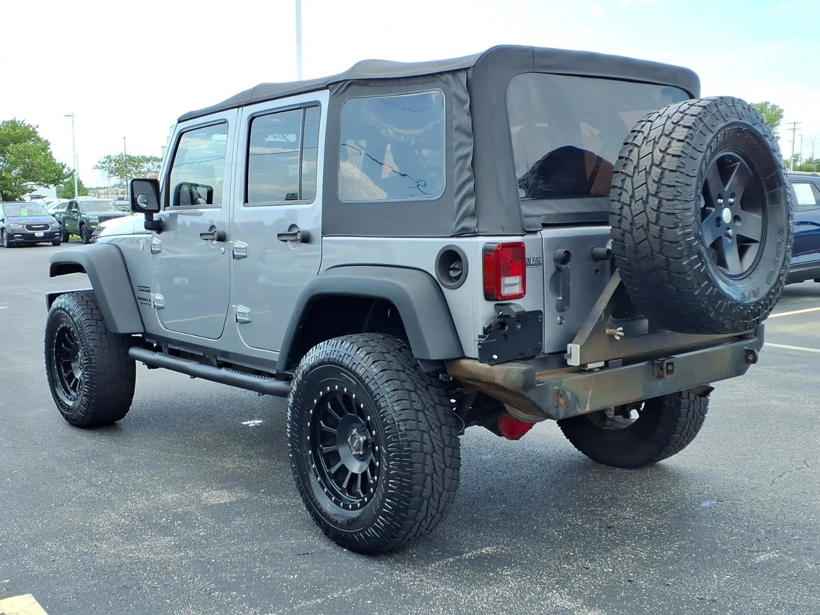 Used 2013 Billet Silver Metallic Jeep Sport image 5