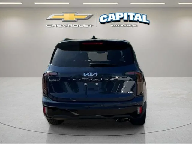 Used 2024 Blue Kia EX X-Line image 4