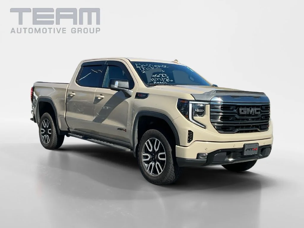 Used 2023 DESERT SAND METALLIC GMC AT4 image 1