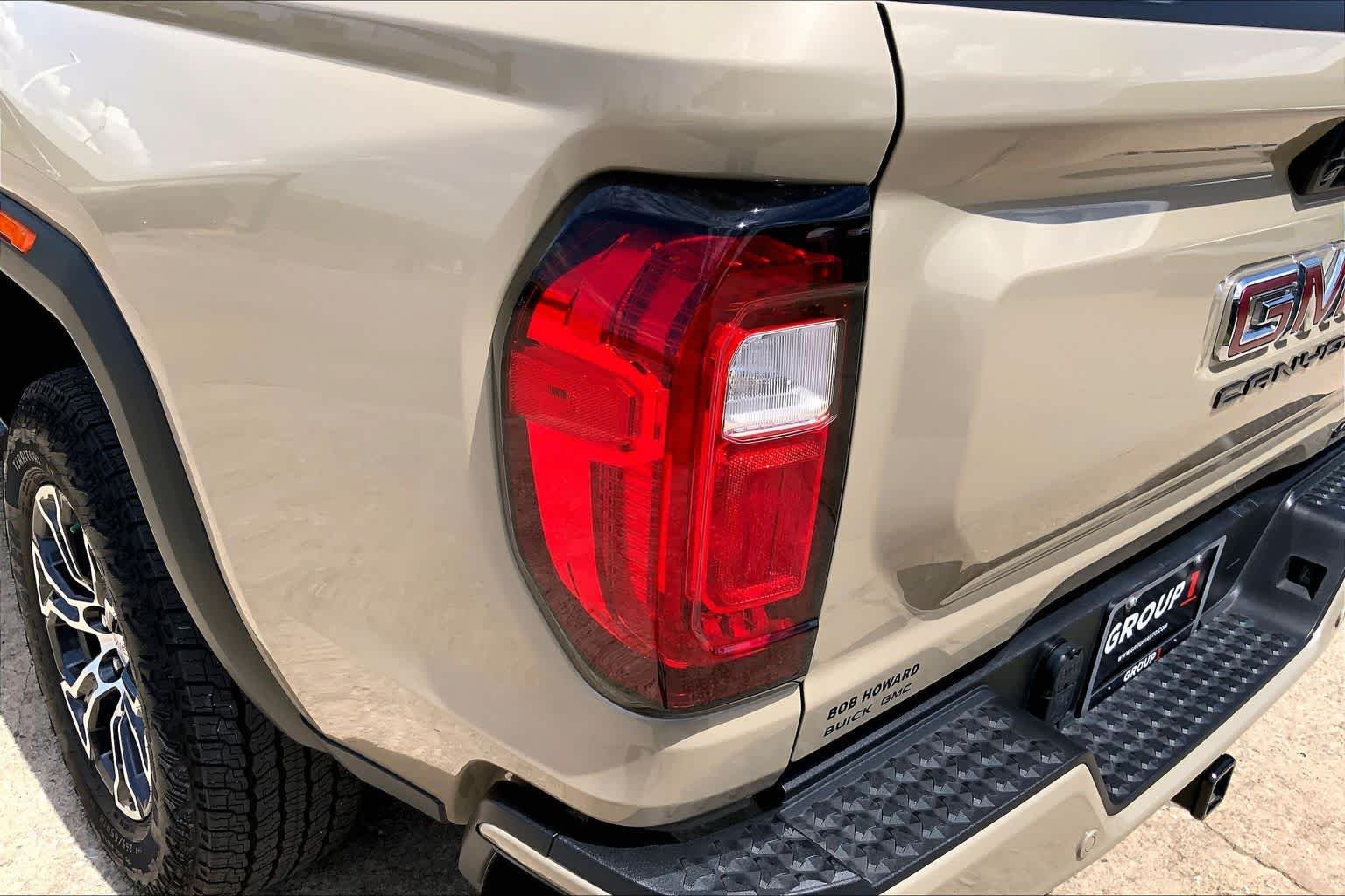 Used 2024 Desert Sand Metallic GMC 4WD AT4 image 28