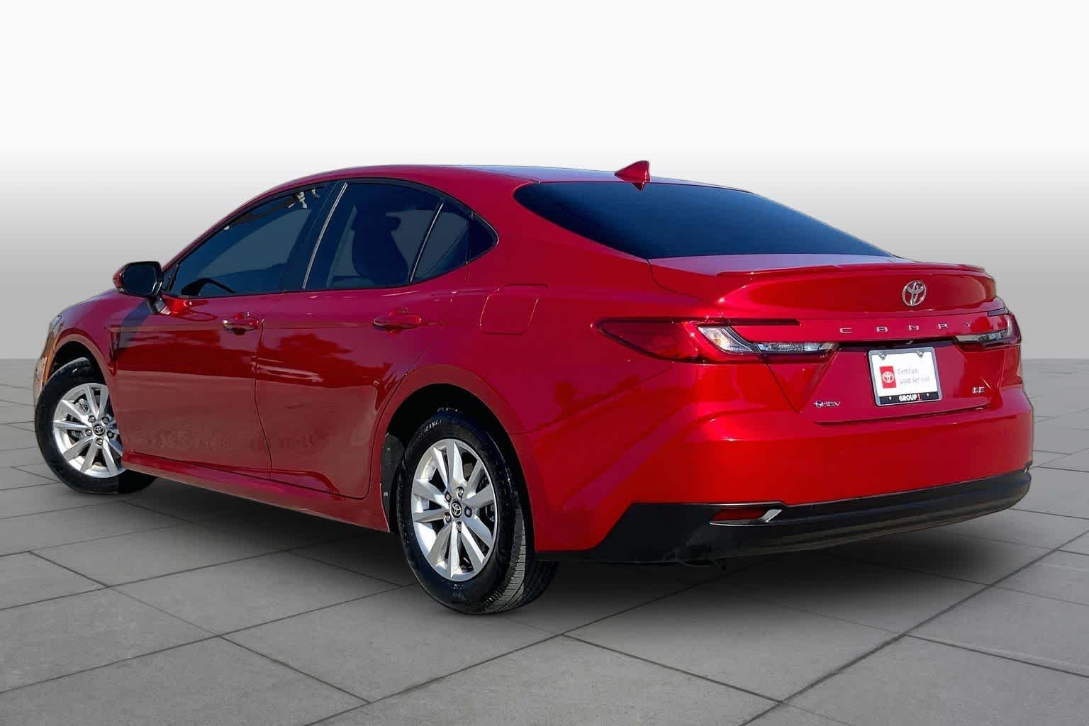 Used 2025 Supersonic Red Toyota LE image 12
