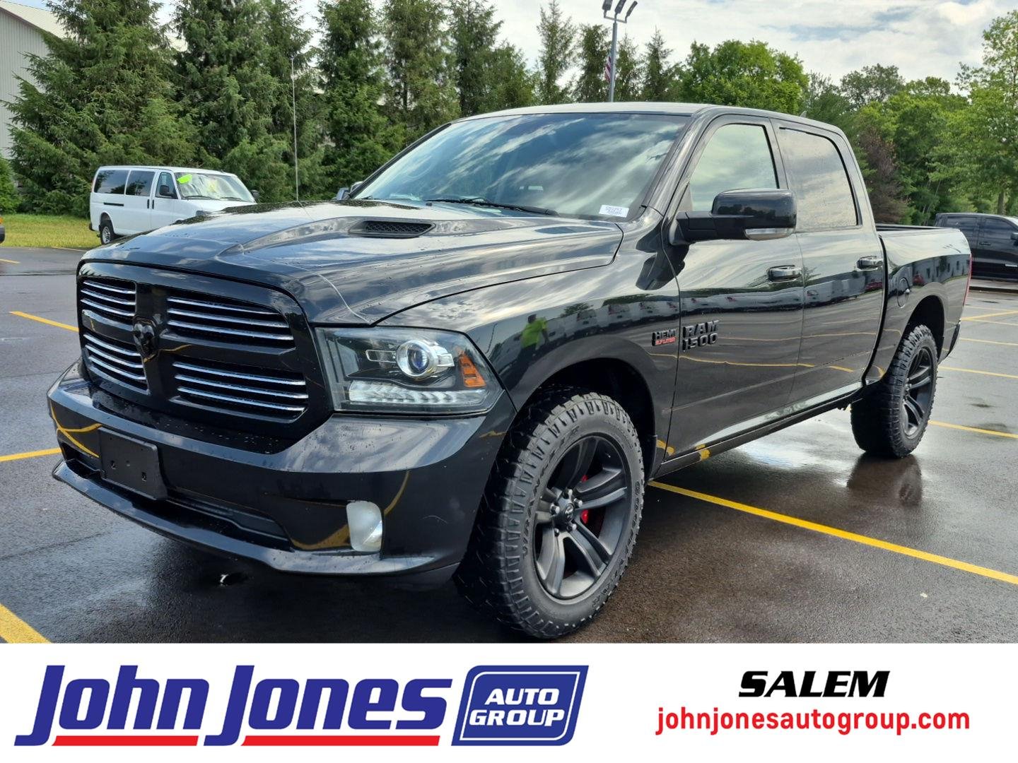 Used 2016 Brilliant Black Crystal Pearlcoat Ram Sport image 1