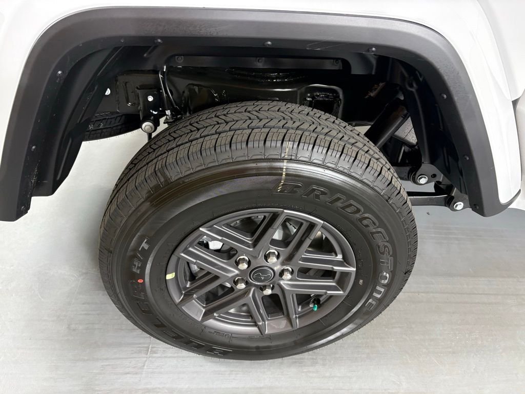 New 2026 Bright White Clear-Coat Exterior Paint Jeep Sport S image 10