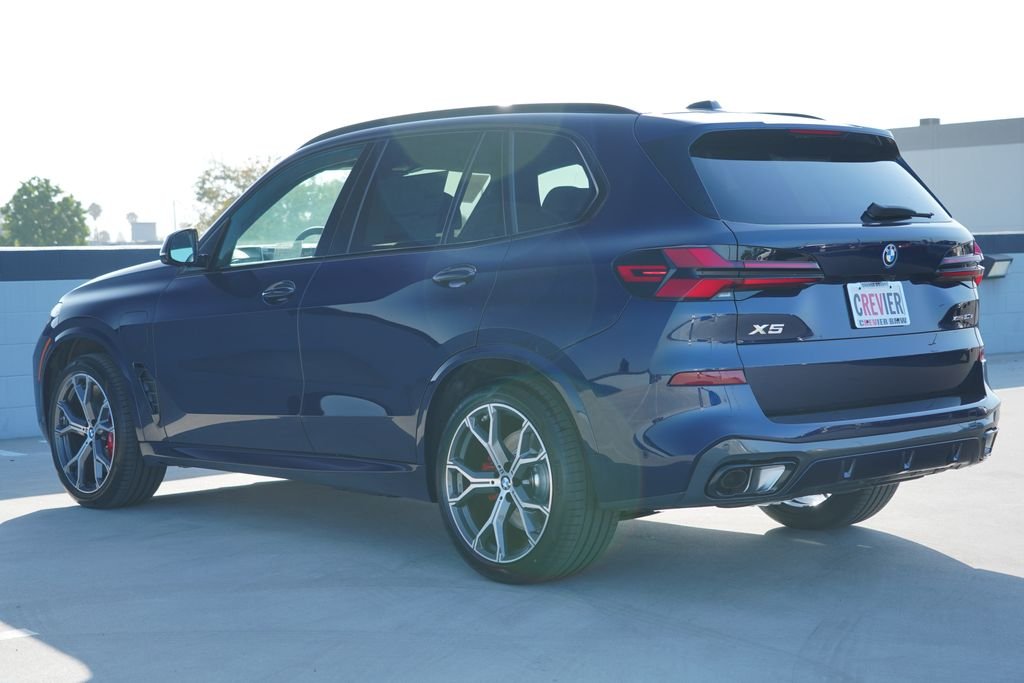 New 2026 Tanzanite Blue II Metallic BMW xDrive50e image 8