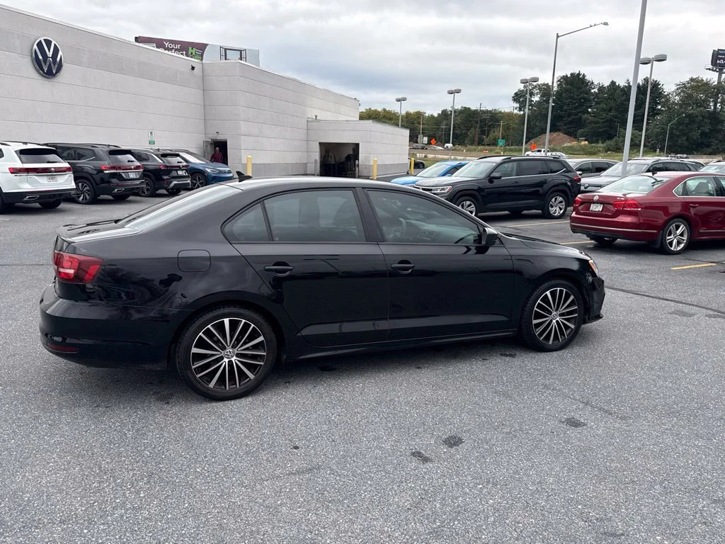 Used 2016 Black Uni Volkswagen 1.8T Sport image 14
