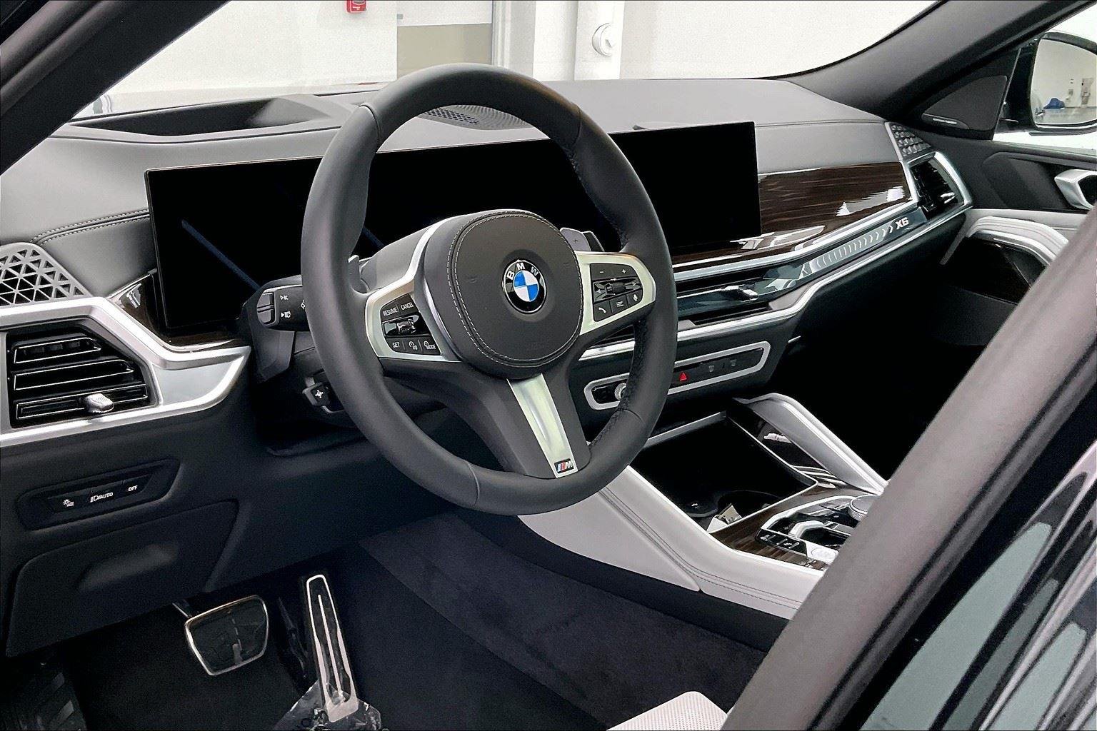 Certified Used 2025 Black Sapphire Metallic BMW xDrive40i image 14