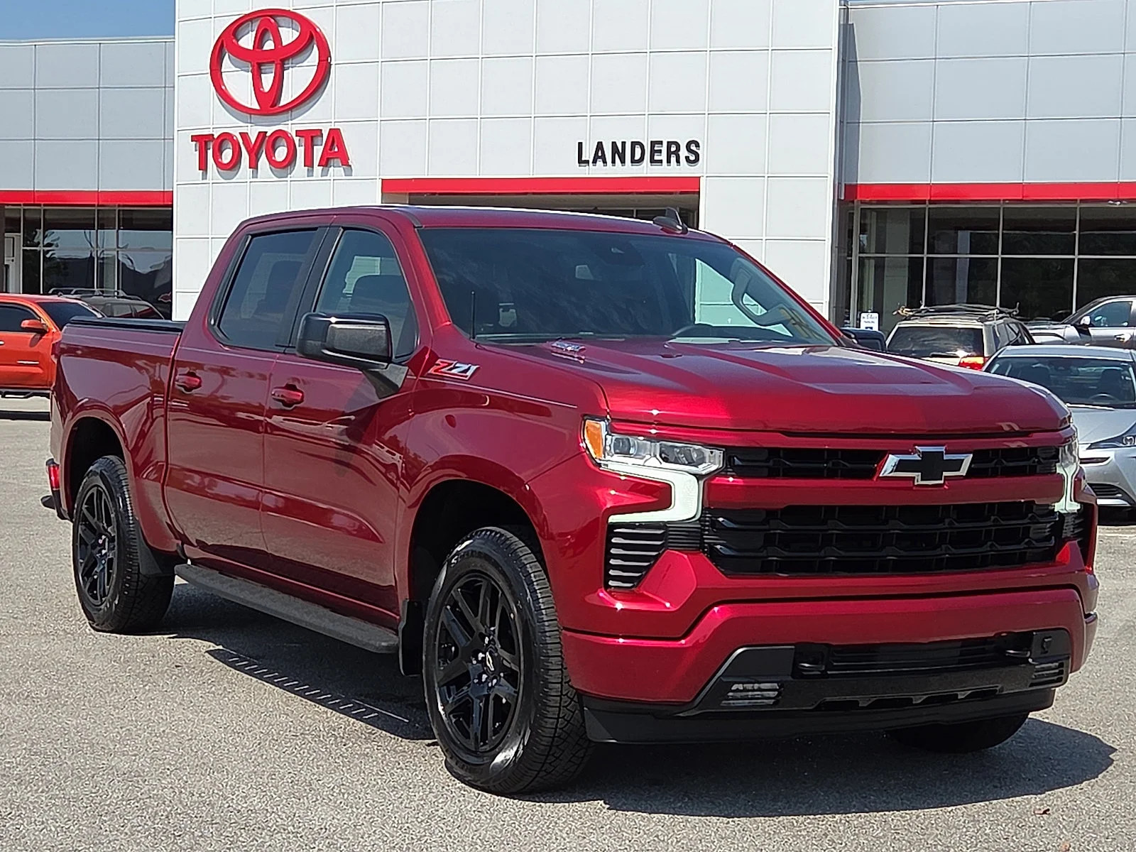 Used 2023 Radiant Red Tintcoat Chevrolet RST image 1