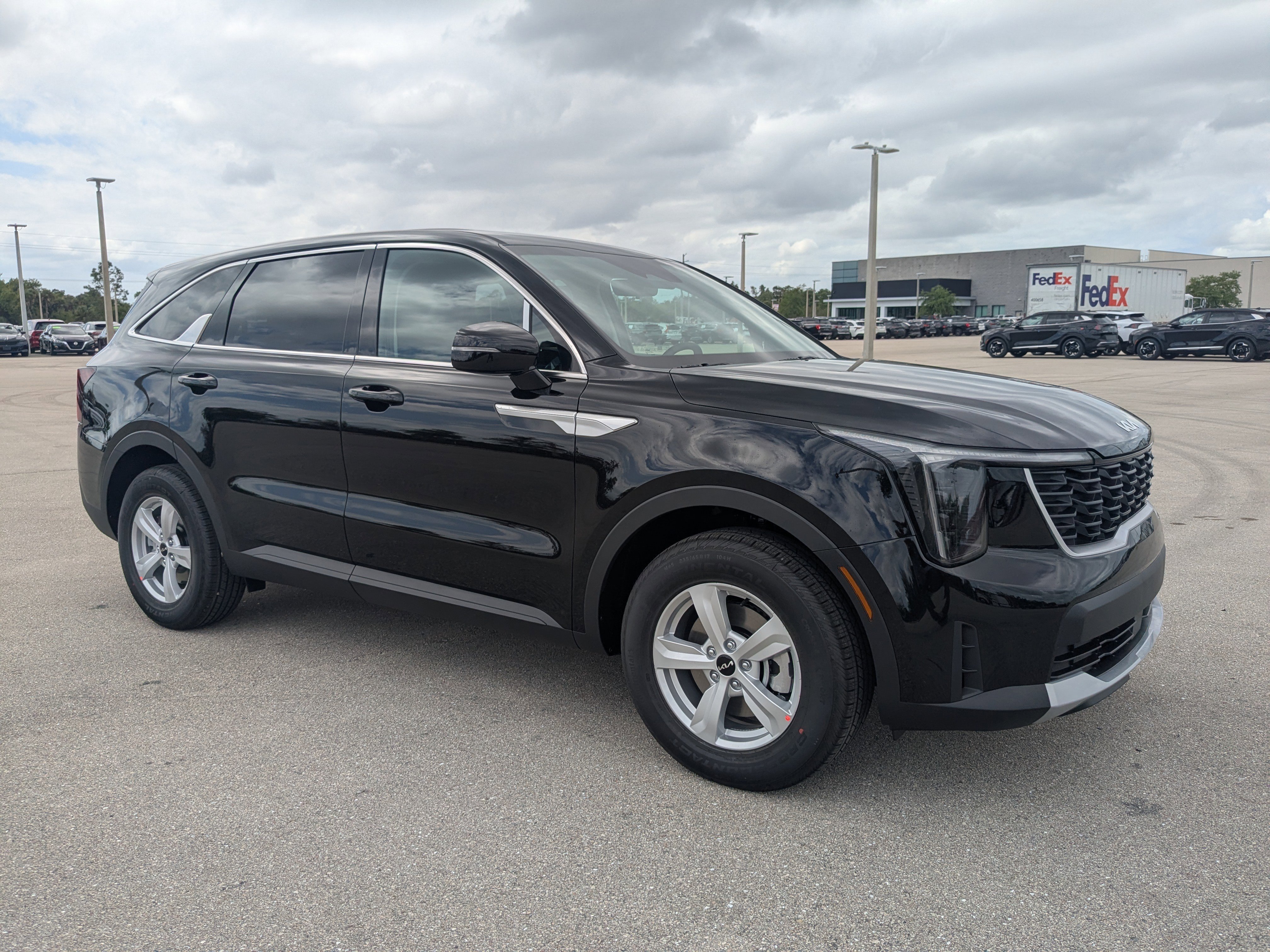 New 2026 Ebony Black Kia LX image 2