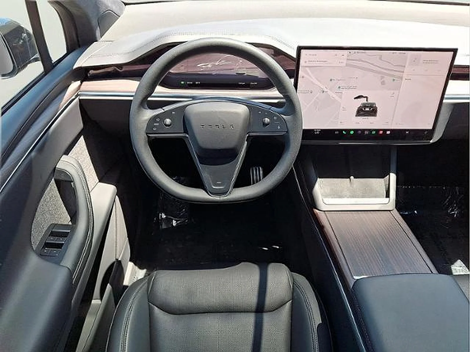 Used 2024 Solid Black Tesla Long Range image 9