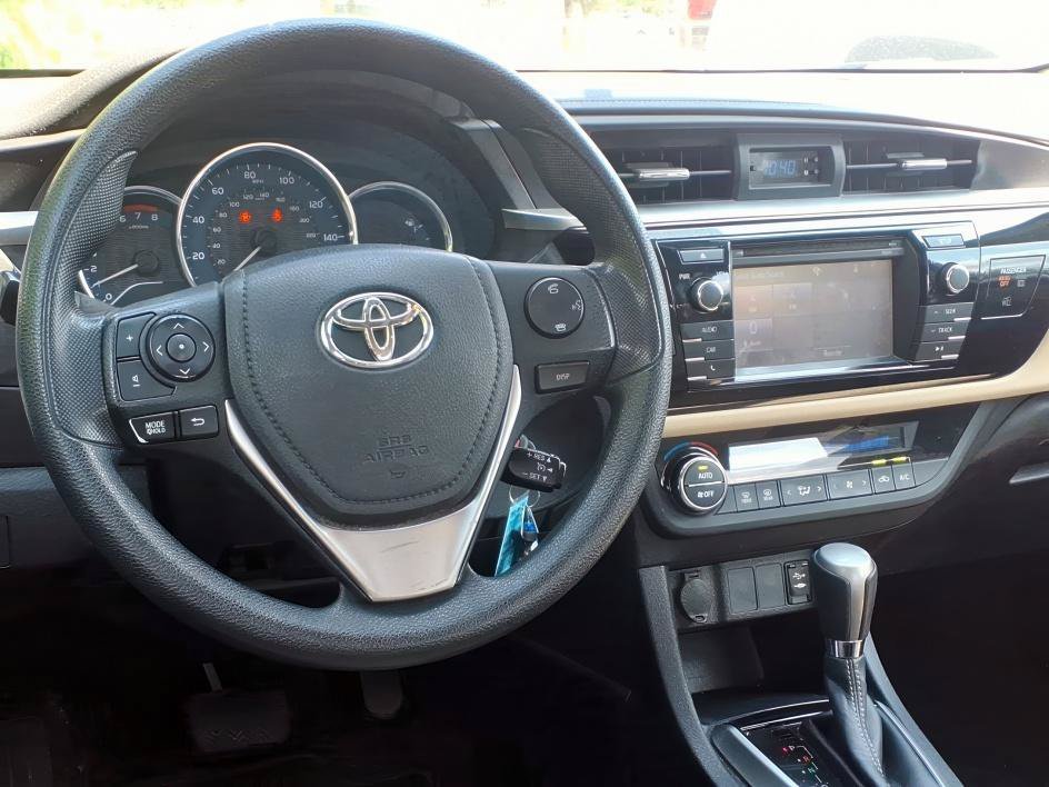 Used 2016 Brown Sugar Metallic Toyota LE image 10