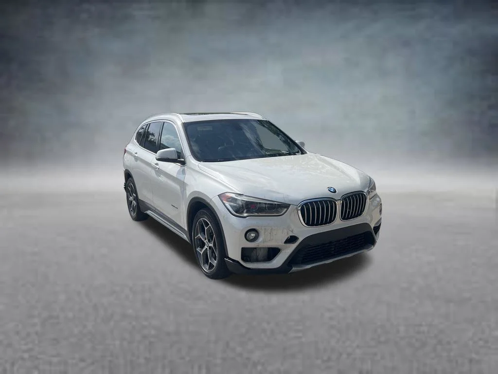 Used 2016 BMW X1 28i with VIN WBXHT3C30G5F65059 for sale in Fort Pierce, FL