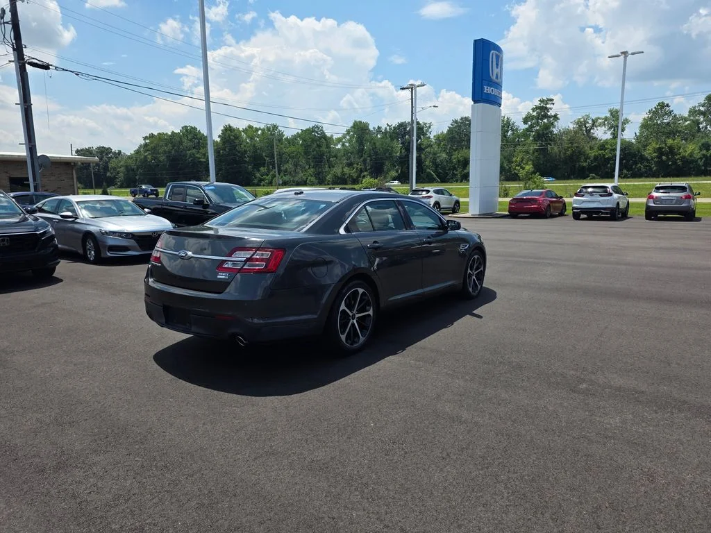 Used 2015 Magnetic Metallic Ford SEL image 3