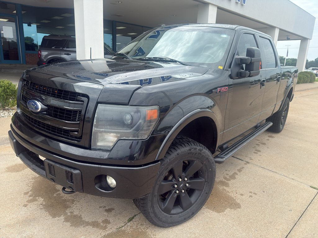 Used 2013 Tuxedo Black Metallic Ford FX4 image 2