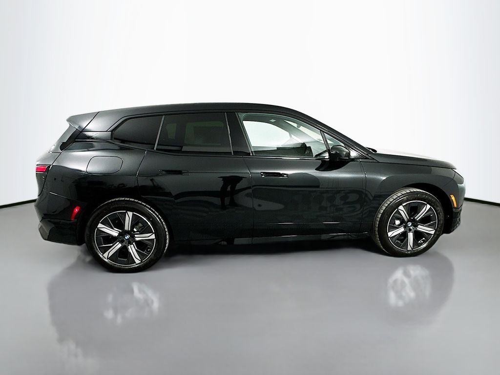 Used 2026 Black Sapphire Metallic BMW xDrive60 image 4