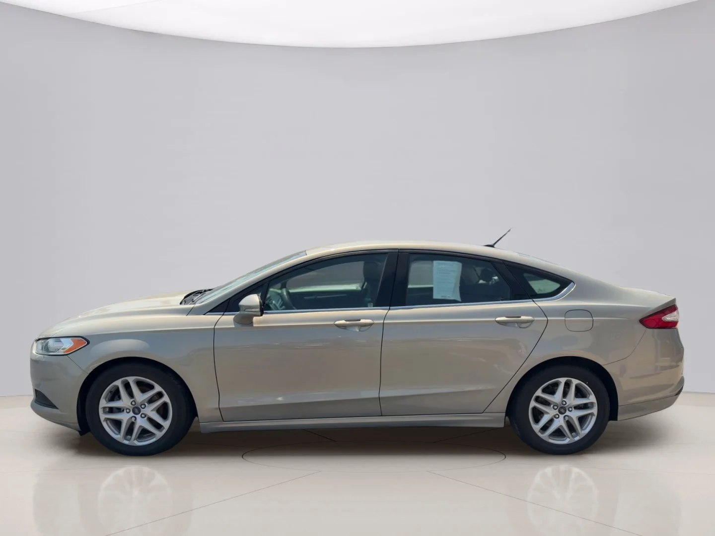Used 2016 Gold Ford SE image 2