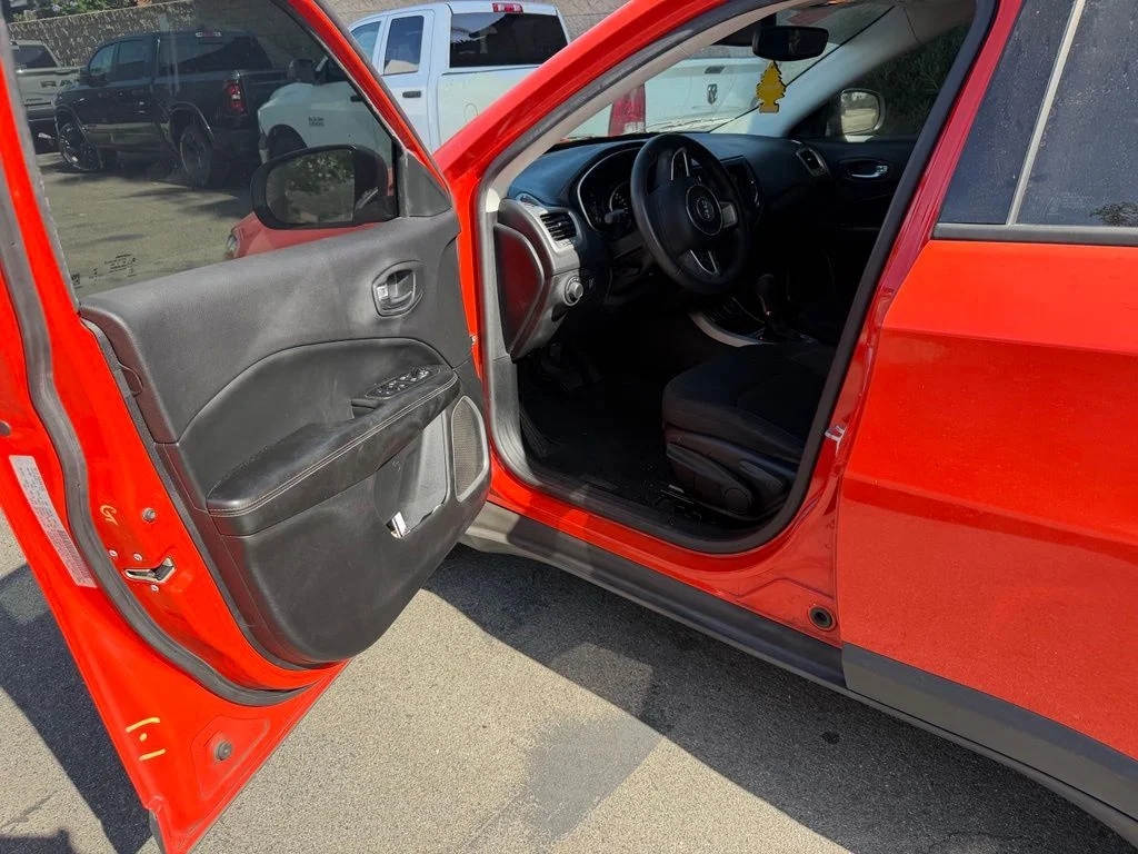 Used 2018 Orange Jeep Sport image 16