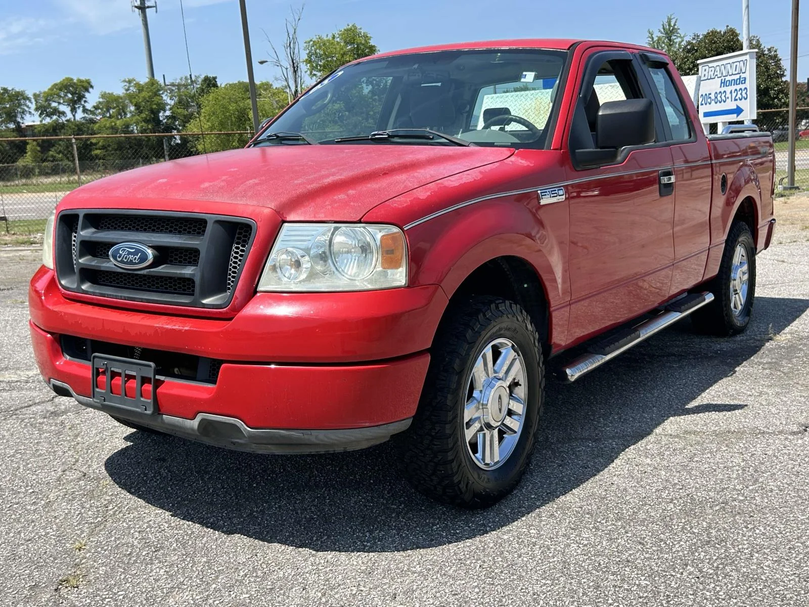 Used 2005 Red Ford Supercab 133 STX image 4