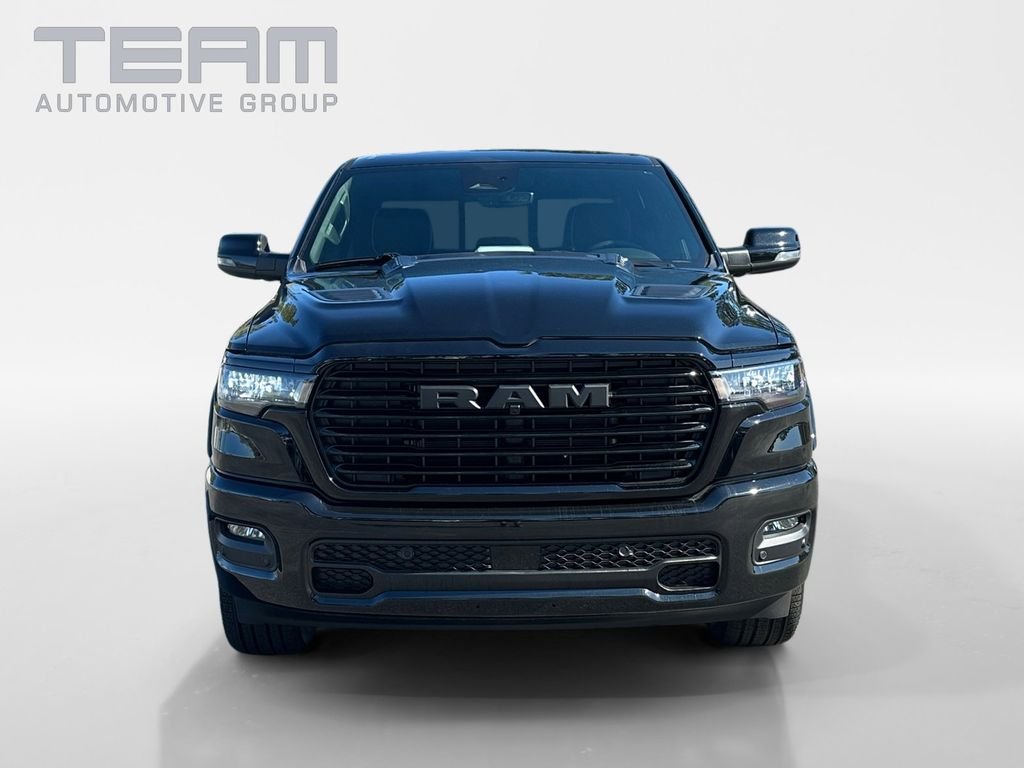 New 2026 Diamond Black Crystal Pearl-Coat Exterior Paint RAM Laramie image 2